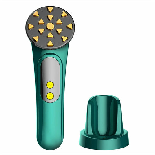 Groene gezichtsmasseur met ronde LED-kop en goudkleurige puntjes